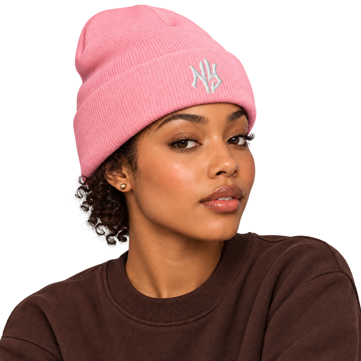 Female model wearing NY Cuffed Beanie in Baby Pink