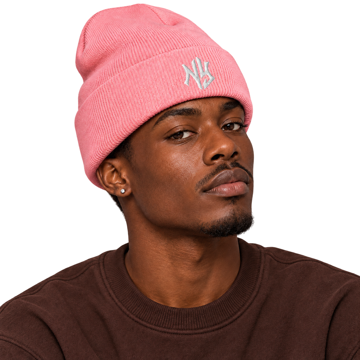 Male model wearing NY Cuffed Beanie in Baby Pink