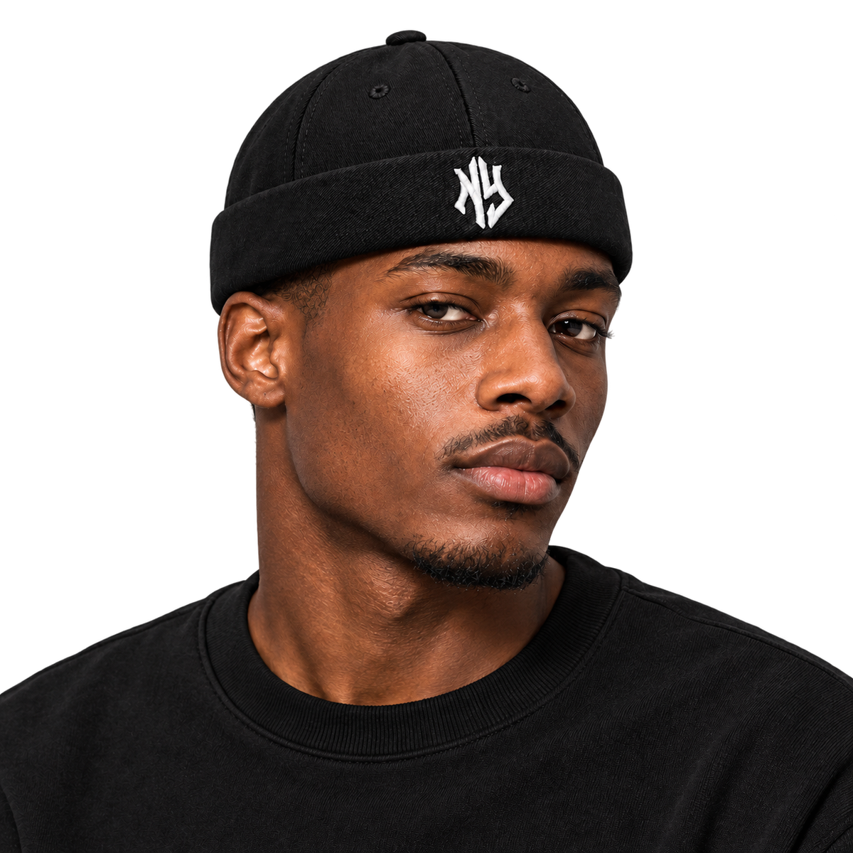 Male model wearing NY Brimless Hat in Black