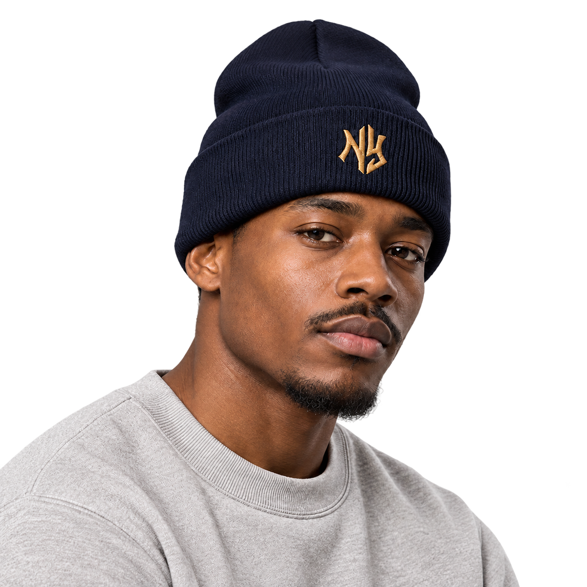 Female model wearing NY Cuffed Beanie in Brown