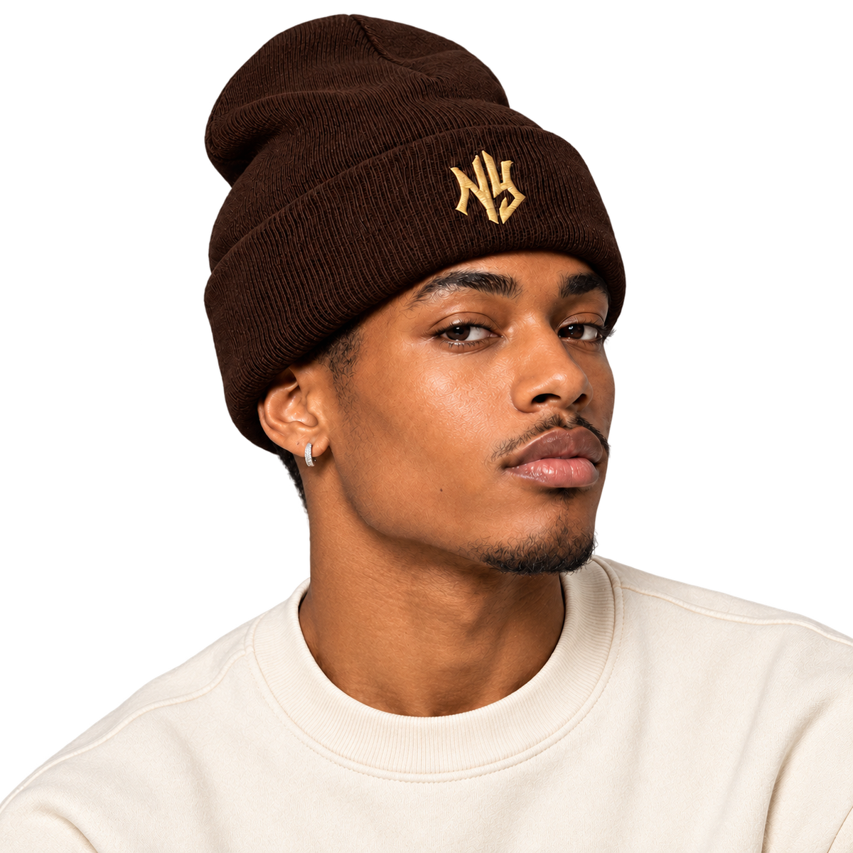 Male model wearing NY Cuffed Beanie in Brown