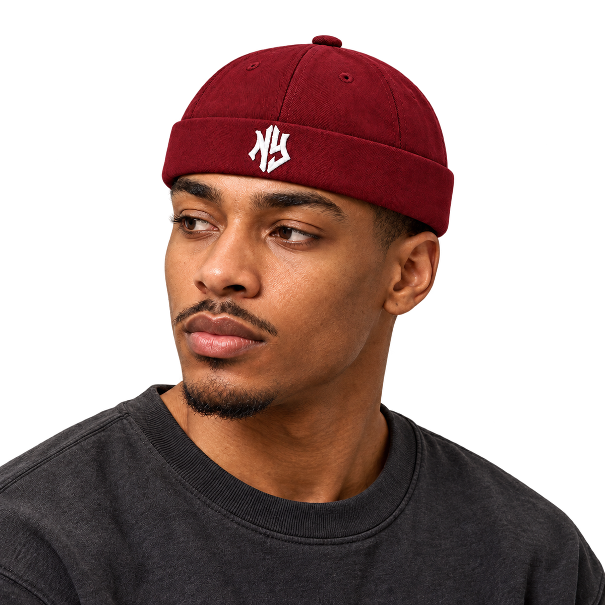 Male model wearing NY Brimless Hat in Burgundy
