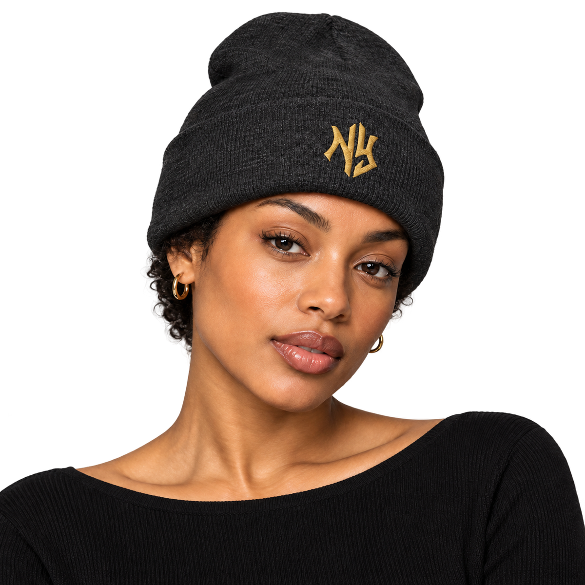 Female model wearing NY Cuffed Beanie in Dark Grey