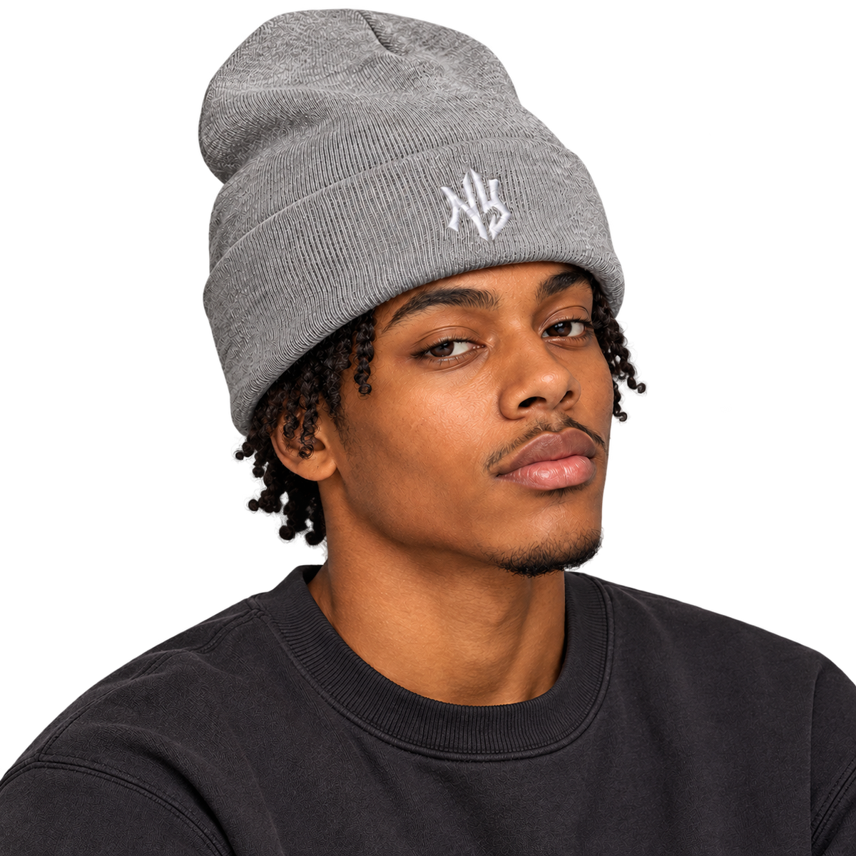 Male model wearing NY Cuffed Beanie in Heather Grey