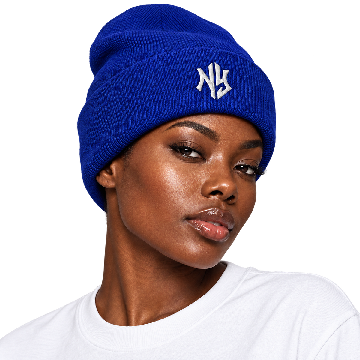 Female model wearing NY Cuffed Beanie in Royal Blue