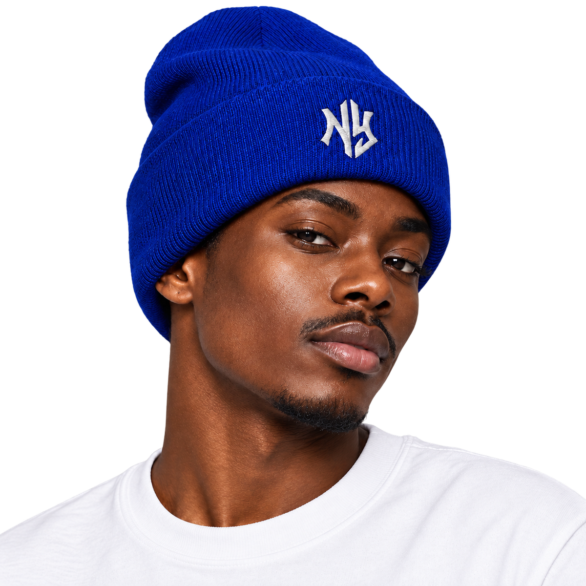 Male model wearing NY Cuffed Beanie in Royal Blue