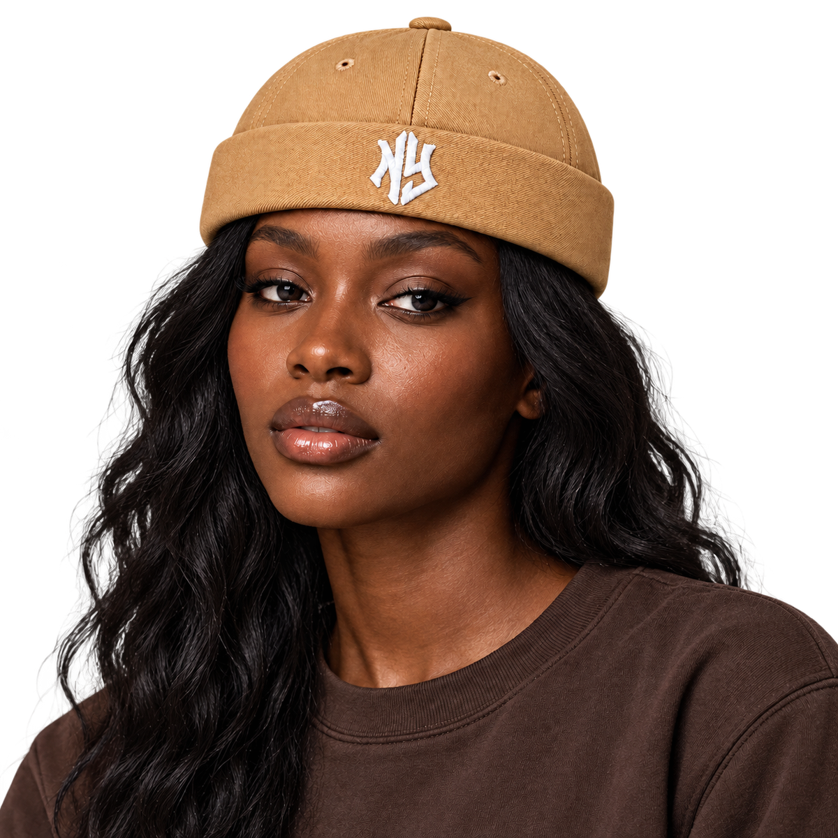 Female model wearing NY Brimless Hat in Tan